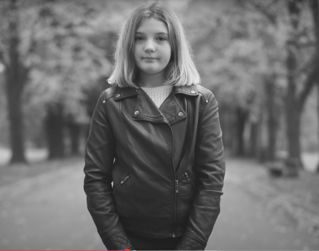 Girl Standing on Street