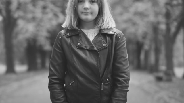 Girl Standing on Street